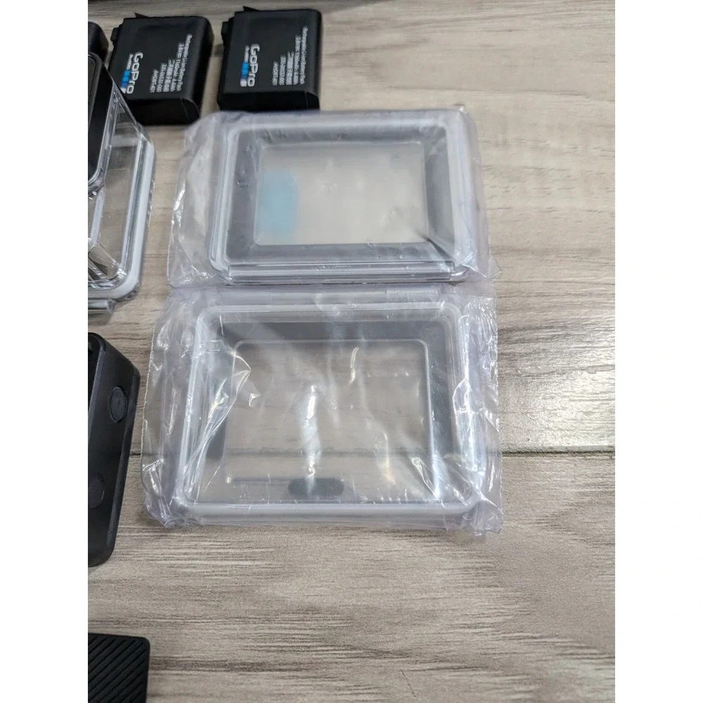 GoPro Hero 4 Silver Edition- with Accessories and Case Included